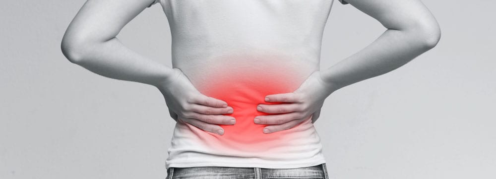 woman suffering from chronic back pain