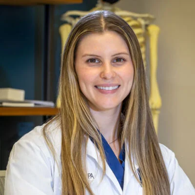 SpineOne physician assistant Lauren Piro smiles