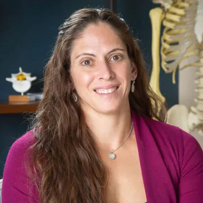 SpineOne physician assistant Tara DeCrescentis smiles